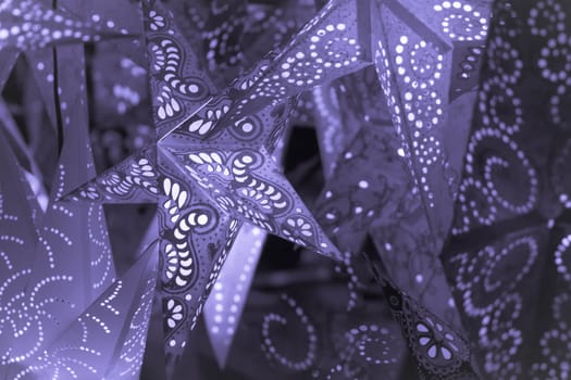 Beautiful shiny star mood lamp in merry advent decoration. Traditional symbol of the best miracle time of the year. Part of series.