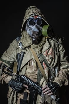 Nuclear post apocalypse. Studio shot of survivor in tatters