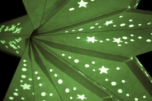 Beautiful shiny star mood lamp is merry advent decoration. Traditional symbol of the best miracle time of the year. Part of series.