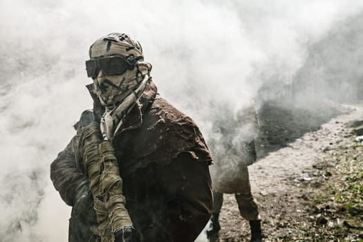 Nuclear post-apocalypse. Survivors in tatters and gas mask on the ruins of the destroyed city