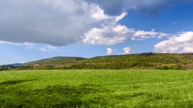 Idyllic rural view of beautiful farmland in the beautiful surroundings of the Iron Mountains, Czech Republic
