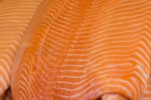Traditional healthy sea food from seafood market with orange white stripes pattern. Quality food for sushi lunch or barbecue dinner.
