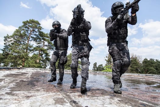 Spec ops police officers SWAT in action in the water