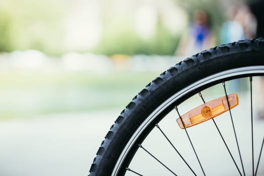 Close up picture of a mountain bike tyre, summer day