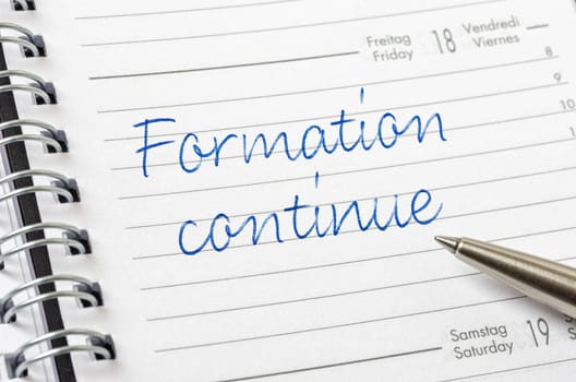 Daily planner with the entry Further training in french - Formation continue