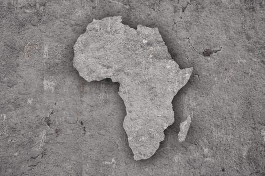 Map of Africa on weathered concrete