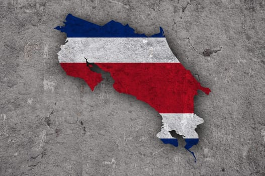 Map and flag of Costa Rica on weathered concrete