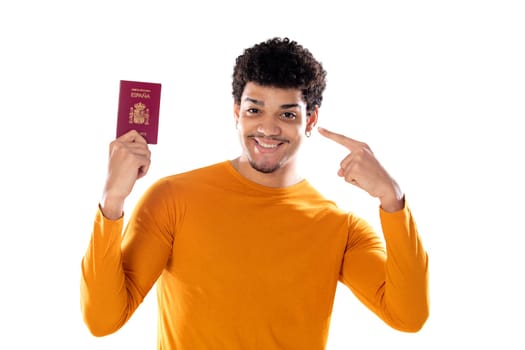 Portrait of happy young African tourist guy showing passport ready for vacation