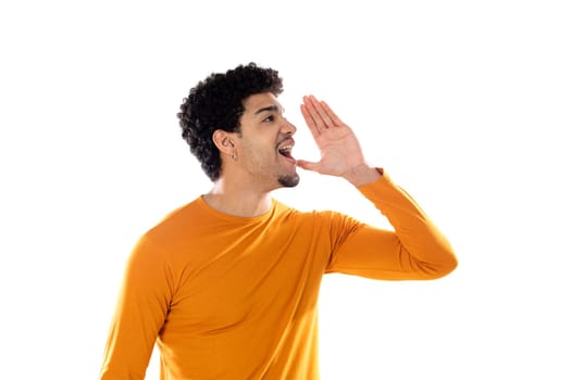 Cute african american man with afro hairstyle wearing a orange T-shirt isolated on a white background
