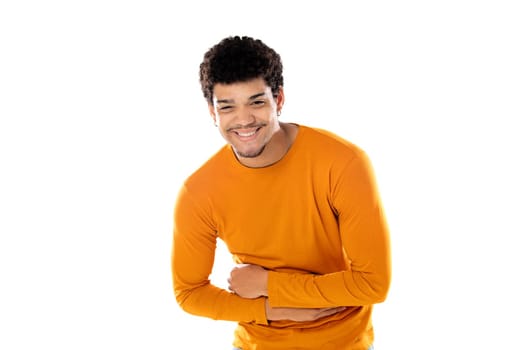 Young african american black man laughing out loud at some hilarious joke, feeling happy and cheerful, having fun isolated on a white background