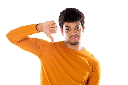 Cute african american man with afro hairstyle wearing a orange T-shirt isolated on a white background