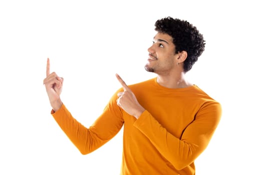 Cute african american man with afro hairstyle wearing a orange T-shirt isolated on a white background