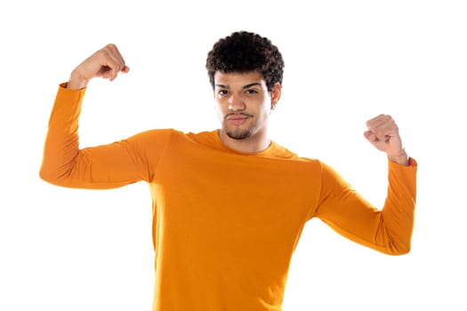 Cute african american man with afro hairstyle wearing a orange T-shirt isolated on a white background