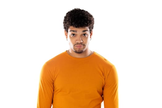 Cute african american man with afro hairstyle wearing a orange T-shirt isolated on a white background