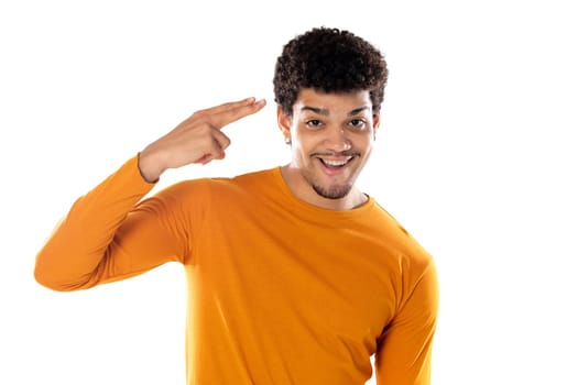 Cute african american man with afro hairstyle wearing a orange T-shirt isolated on a white background