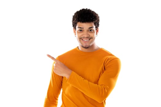 Cute african american man with afro hairstyle wearing a orange T-shirt isolated on a white background