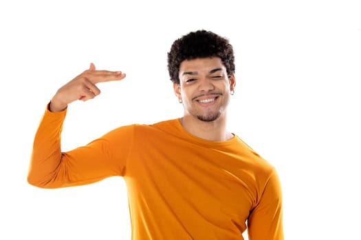 Cute african american man with afro hairstyle wearing a orange T-shirt isolated on a white background
