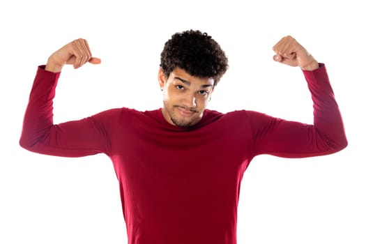 Cute african american man with afro hairstyle wearing a burgundy T-shirt isolated on a white background