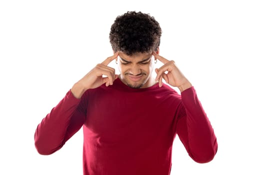 Cute african american man with afro hairstyle wearing a burgundy T-shirt isolated on a white background