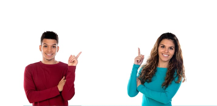 Attractive happy young multiethnic couple isolated on a white background
