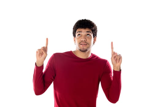 Cute african american man with afro hairstyle wearing a burgundy T-shirt isolated on a white background