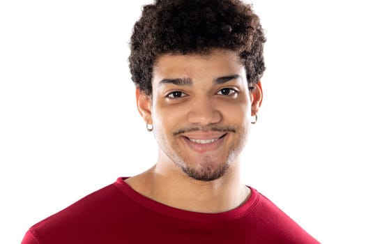 Cute african american man with afro hairstyle wearing a burgundy T-shirt isolated on a white background