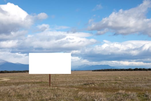 Blank cartel for advertising in the middle of the countryside