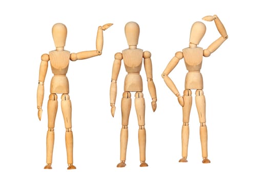 Many wooden mannequin doing differents gestures isolated on a white background