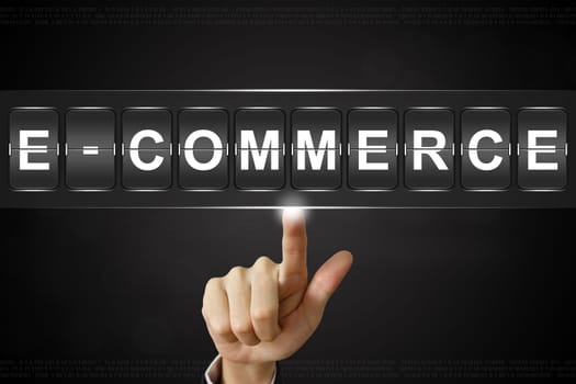 business hand pushing e-commerce on Flipboard Display