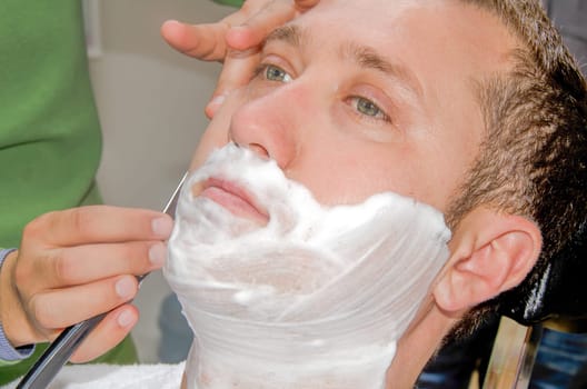 The male barber shave beard