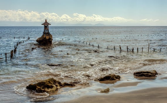Small temple on the shore by the sea, Nusa penida island, Bali, Indonesia