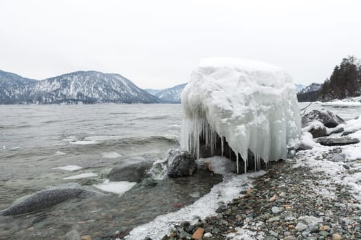 unfrozen Lake Teletskoye in winter. Russia Altai Krai.
