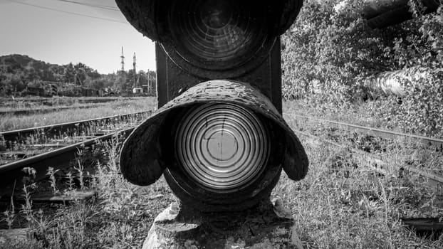 Black and white photo of old semaphore on railroad