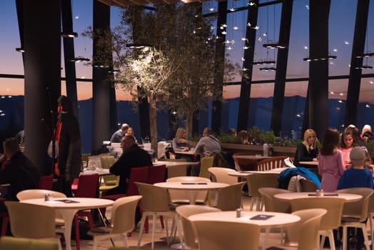 Couple celebrate Valentine's day with romantic dinner in restaurant near the window