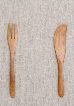 Wooden fork and knife on the table