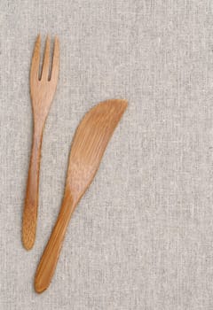 Wooden fork and knife on the table
