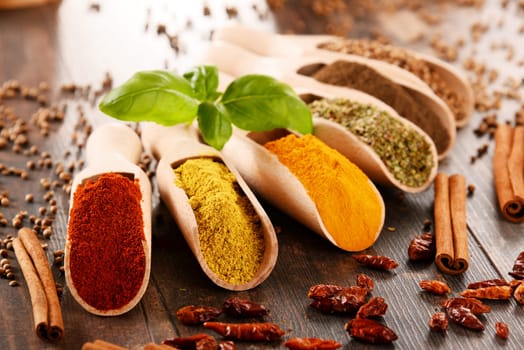 Variety of spices on kitchen table.