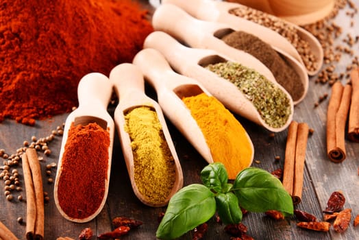 Variety of spices on kitchen table.