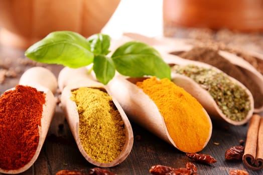 Variety of spices on kitchen table.