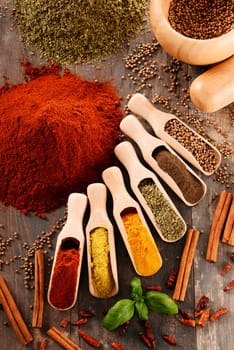Variety of spices on kitchen table.