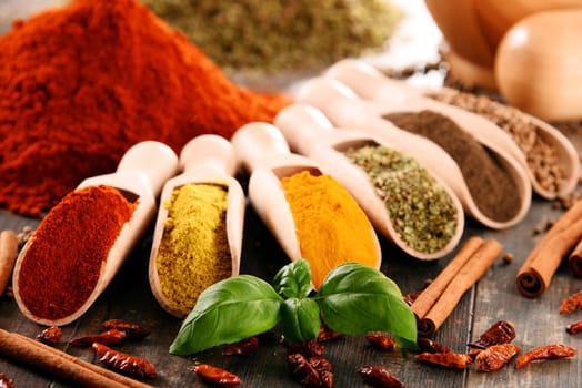 Variety of spices on kitchen table.