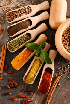 Variety of spices on kitchen table.