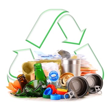 Composition with recyclable garbage consisting of glass, plastic, metal and paper isolated on white background