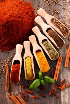 Variety of spices on kitchen table.