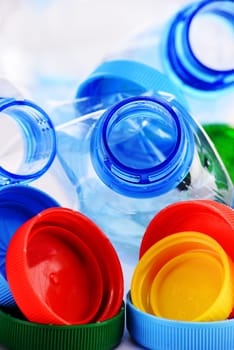 Composition with plastic bottles and caps.