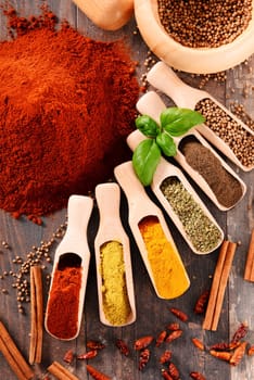 Variety of spices on kitchen table.