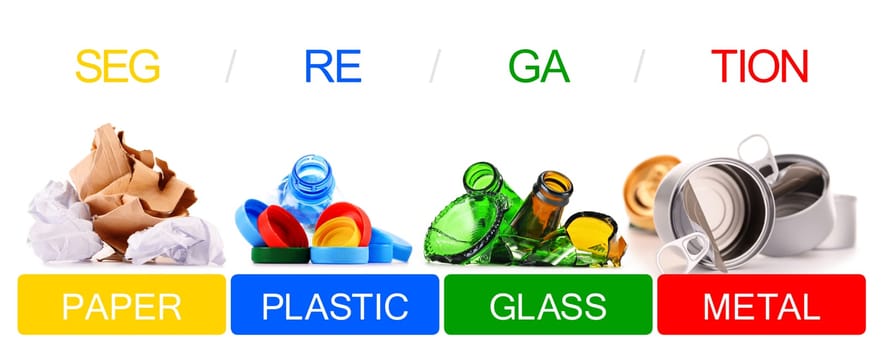 Recyclable garbage consisting of glass, plastic, metal and paper isolated on white background