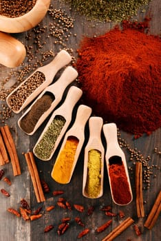 Variety of spices on kitchen table.