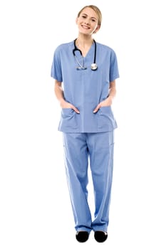 Confident female physician with warm smile