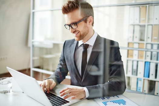 Happy businessman networking in office
